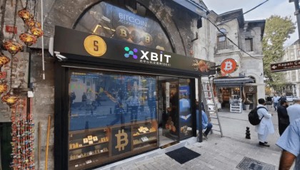 特朗普关税风暴升级至50% 币安网合约交易平台承压 XBIT或成避险新宠?